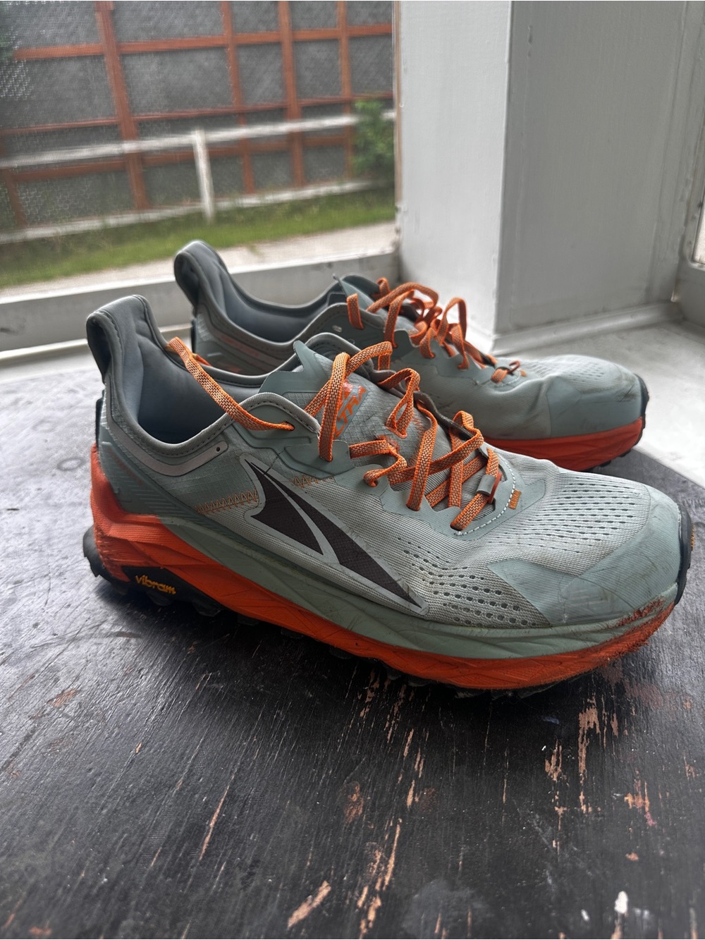 Altra Light Teal Trail Sneakers with Orange Accents